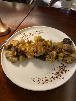 Cauliflower steak.  Came with roasted mushrooms and onions and had great flavor! at Mahina Vegan Table in Seoul