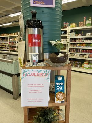 Self service free coffee offered to shoppers with plant milk and chocolate samples   at Vegan Budin in Reykjavik