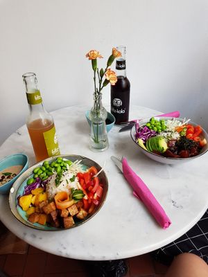 Tofu Terijaky Bowl(vegan, left) and Salmon Poké Bowl(with fish, right) at Holy Nosh Deli in Kassel