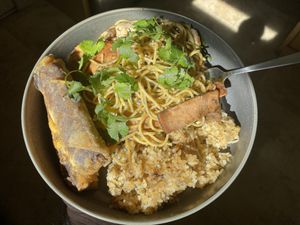 Garlic noodles, garlic rice, and egg rolls.  at Mitasie 3 in Huntington Beach