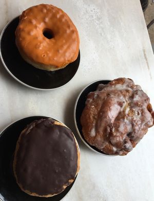 apple fritter, Boston Creme, chai tea donut  at Sweet Freedom Bakery in Philadelphia