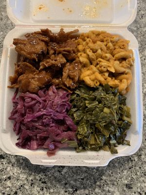 Collards, purple cabbage, Mac, and ribs  at A Peace of Soul in Columbia