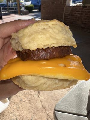 Biscuit sandwich with sausage, just egg and cheese! This was sooo delicious   at A Peace of Soul in Columbia