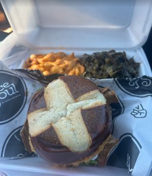 “Chicken” sandwich w/ mac & chz & collards. Everything on menu is 100% vegan    at A Peace of Soul in Columbia