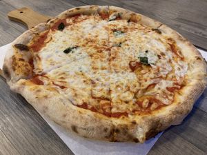 Margherita pizza with vegan mozzarella at Gusto Pizza in Taipei