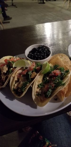 Jackfruit, seitan, fried avocado tacos. Come with a side of BB at Kale My Name in Chicago