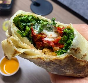 Italian seitan wrap with vegan aioli and mozz  at Kale My Name in Chicago