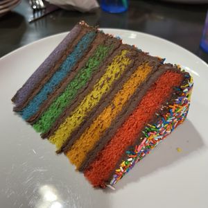 Pie Pie My Darling’s Rainbow Sprinkle Cake—OMG the most delicious cake ever!! 🤤   at Kale My Name in Chicago