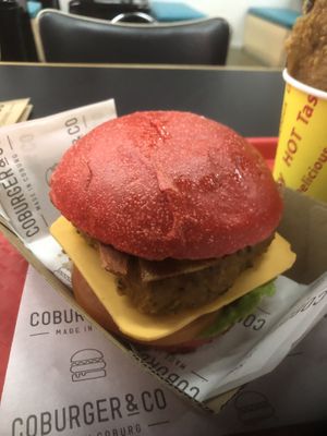 Vegan chicken burger with bacon! Fresh tomato and lettuce good size $15.50  at Coburger & Co in Coburg