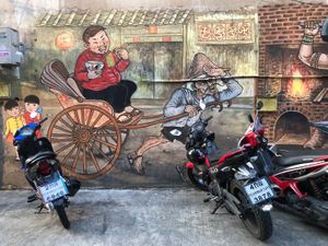 Another area to explore and lots of authentic thai food. Impressive mural of a Chinese man eating noodles on a rickshaw. at Vegan Food Crawl - Bangkok in Bangkok