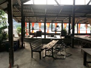 A hidden sight just a few doors down on the riverside, 200year old building shell. Renovated as a cafe and pop-up art space. at Vegan Food Crawl - Bangkok in Bangkok