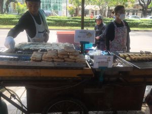 Snacks of Thai street local market! Grilled bananas (Nam wah) with coconut syrup. You will taste and see different bananas grown in Thailand and most of thai desserts are vegan. at Vegan Food Crawl - Bangkok in Bangkok