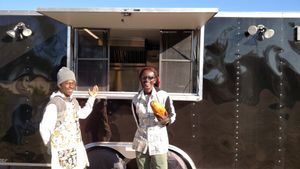 Benge & father Ras Rody at Ras Rody's Jamaican Vegan  in Santa Fe