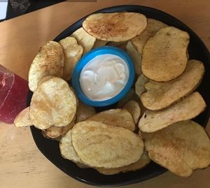 papas caseras con veganesa (mayonesa vegana) at Dulcinea Café Vintage in Cali