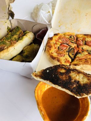 delivery pizza and Beyond meat sausage hot dog, Go Beyond!  at Dulcinea Café Vintage in Cali