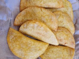 Gluten free corn empanada with plant basee meat, mash potatos and stew of veggie at Bolivian Pastries in Wivenhoe