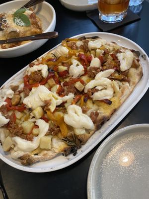 Potato pizza (mozzarella, pork & fennel sausage, potato, capsicum, rosemary oil) at Nonna's Nightmare in West End