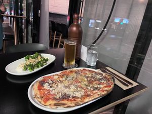 Pizza Amatrice & Broccolini Grigliati  at Nonna's Nightmare in West End