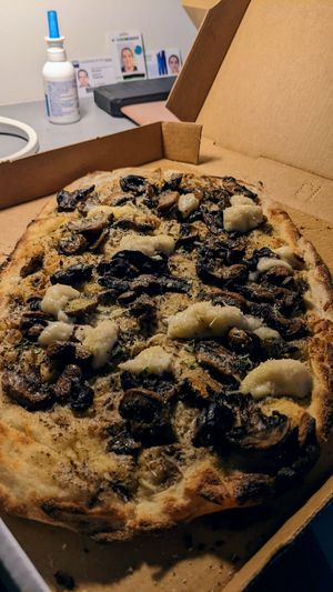 Magic mushroom pizza at Nonna's Nightmare in West End