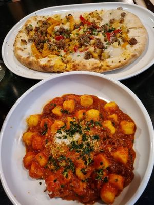 Potato, rosemary & sausage pizza with "beef" ragu gnocci. at Nonna's Nightmare in West End