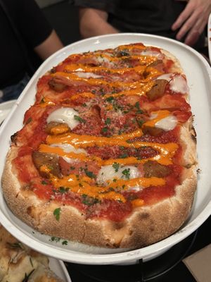 ITALIAN NIGHTMARE $26.50 Tomato, mozzarella, grilled pineapple, VBacon, Chilli, Lime aioli. (1 of our chosen Banquet Pizza Options)  at Nonna's Nightmare in West End