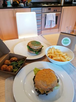 The Green and The Yellow Burgers with the delicious chips and outstanding sides!  at Five Buns in South East London