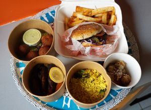 Delivery: Akara + Yassa + Doudou Jack burger + Manioc fries + Diabolitos at L'Embuscade in Paris
