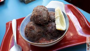 Arachide bowl with tomatoes at L'Embuscade in Paris