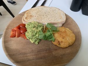 Vegan version of avocado toast. Really delicious, busy a bit pricey at $22    at Against The Grind in Mill Park