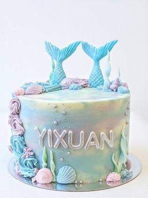 Mermaid cake with shimmery hand crafted details. at Alice in Cakeland in Rotterdam