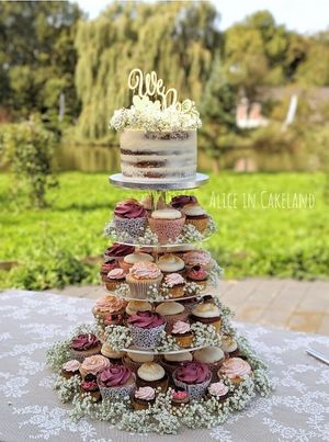 Wedding cupcakes tower with mixes flavors. at Alice in Cakeland in Rotterdam