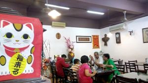 A family at Sweet Garden Vegetarian Restaurant in Petaling Jaya