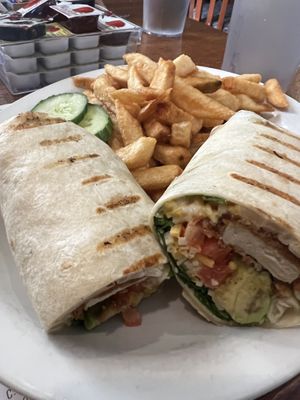 Light & bright wrap with chick’n tenders (add-on) and fries. Delicious!   at Queens Coach in Niagara Falls