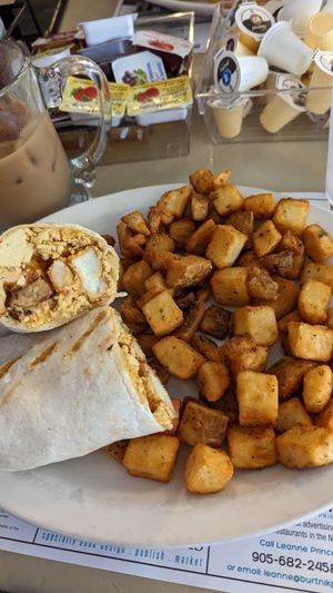 Rustic wrap with beyond sausage and scramble tofu at Queens Coach in Niagara Falls