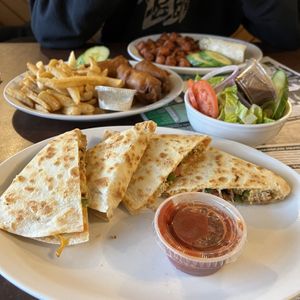 Chicken Quesadilla with a side salad, Fish and Chips  at Queens Coach in Niagara Falls