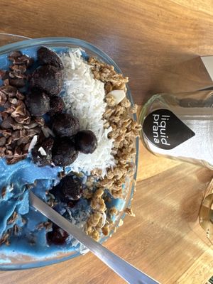 Yummy açaí bowl. Not so sure why they put the nuclear blue dye in it 😳  at Liquid Prana in Playa Del Carmen