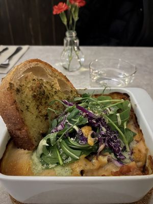 Lasagna with garlic bread  at Skrymslet Under Trappan in Norrkoping