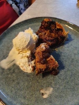Vanilla ice cream with 
a) blueberry pie
b) chocolate and fudge cake. Best enjoyed with coffee on the side. at Skrymslet Under Trappan in Norrkoping