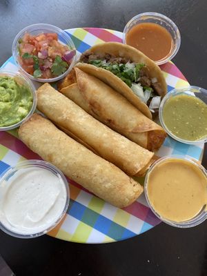 Tacos taquitos, and sauces. at Chicana Vegana in Fullerton