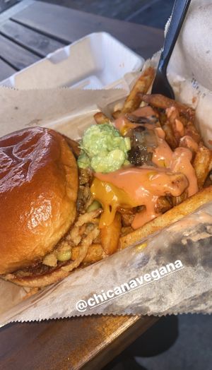 shroom steak burger upgraded to animals less fries with guac at Chicana Vegana in Fullerton