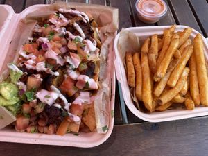 Nachos and side of fries for best of both worlds  at Chicana Vegana in Fullerton