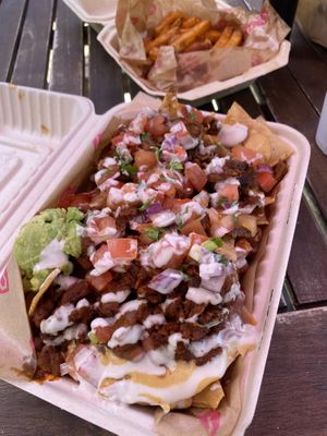 Nachos and side of fries- you can split proteins on your nachos so try them all out!  at Chicana Vegana in Fullerton