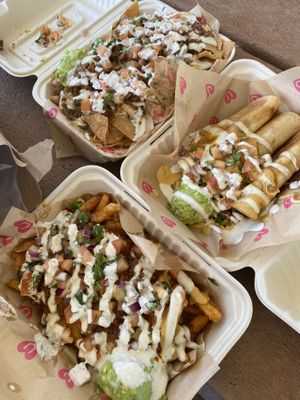 Loaded chili cheese fries, nachos, and rolled potato taco special  at Chicana Vegana in Fullerton