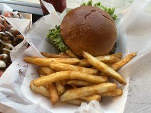 Burgers come with fries!  at Chicana Vegana in Fullerton