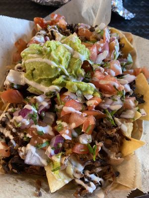 Loaded nachos - a MUST order!  at Chicana Vegana in Fullerton