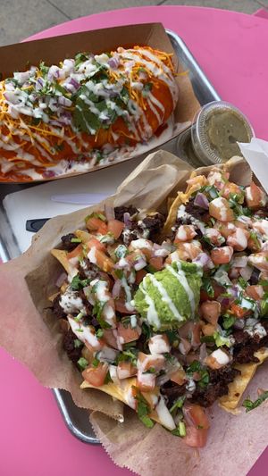 Burrito Mojado y Loaded Nachos con Salsa Verde  at Chicana Vegana in Fullerton