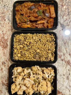 Eggplant stew, bulgur and chickpeas, and sautéed cauliflower  at Vegan Stops in Garden Grove