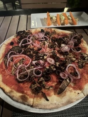 Vegetarian pizza with no cheesee  at Il Pellicano Cucina Italiana in Caye Caulker