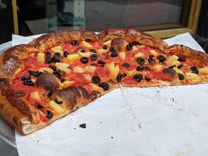 Build your own pizza with no cheese, olives and pineapple at Fat Daddy's Pizzeria in Provo