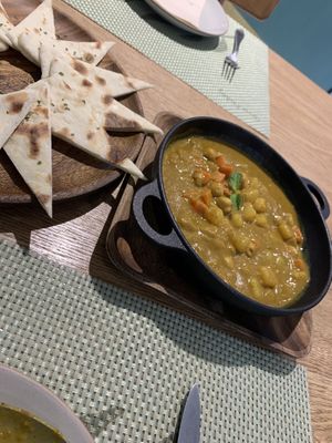 Chickpea curry with flatbread at Green Friday in Shanghai